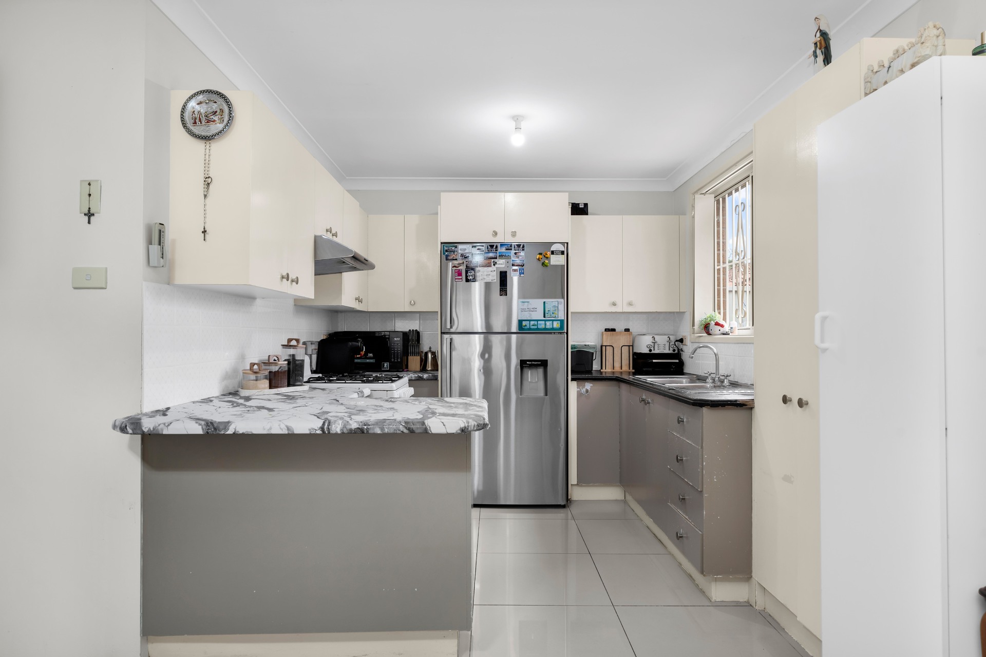 13 Osprey Avenue Green Valley NSW 2168 AUS